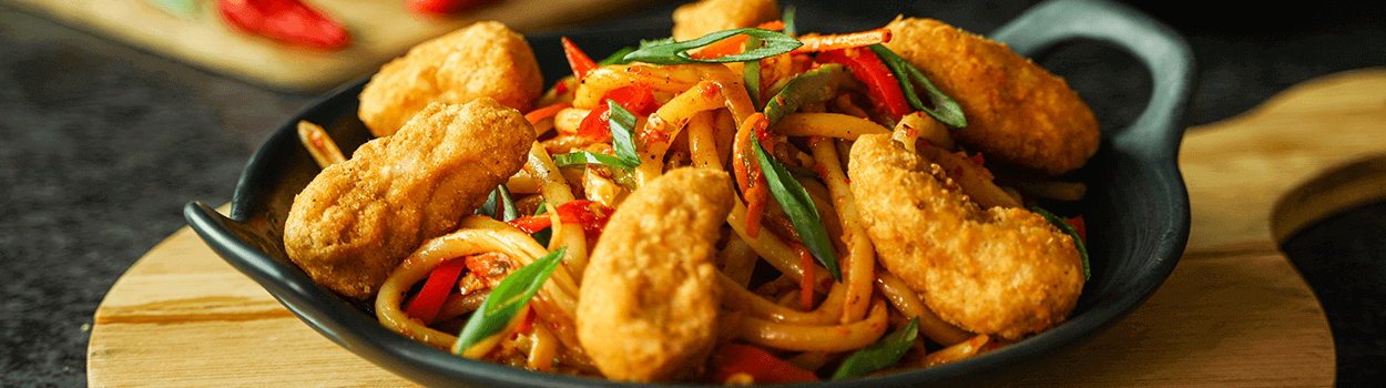 Schezwan Noodles With Tempura